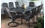 Alfresco Barbados All Weather Wicker Dining Set With 46" X 86" Rectangle Cast Aluminum Dining Table And Chairs