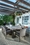 Alfresco Cornwall Woven Wood Set With 94.5" Rectangular Wood Dining Table And 8 Dining Arm Chairs With Sunbrella Cast Shale Cushions