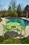 Alfresco Madina Café Set With 48" Round Café Table With Umbrella Hole And 4 Stackable Café Chairs In Gecko Green Finish